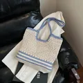 Chic woven tote bag in beige with blue stripes for summer beach vacations - Large / Blue