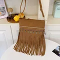 Dark brown bohemian tassel crossbody bag with ethnic weaving and silver coin pendants - Brown