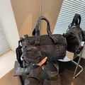 Black washed denim mini Boston bag with round coin purse and adjustable wide strap - Black