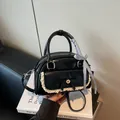 Elegante schwarze Boston-Handtasche mit weißem Spitzenrand, Blumenschleife und Band - Schwarz