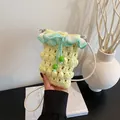 Handgefertigte Häkel-Handytasche in Gelb und Minzgrün mit Popcorn-Stich-Textur - Gelb
