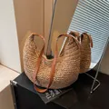 Large woven hobo beach bag in natural beige with brown adjustable shoulder strap - Brown
