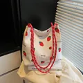 Borsa tote bianca con stampa fragola, manici in corda rossa e tessuto a trama - Rosso