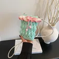 Handmade crochet phone bag in mint green with pink ruffle trim and drawstring - Blue