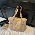 Beige quilted tote bag with diamond stitching and side zippers for daily commute - Khaki