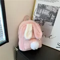 Pink plush mini backpack with cute rabbit ears and a white faux fur pompom ball - Pink
