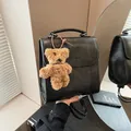 Retro black large capacity faux leather backpack with plush bear and embossed text - With Pendant / Black