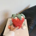 Handmade strawberry crochet shoulder bag in vibrant red and orange gradient yarn - Pink