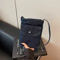 Minimalist deep blue denim crossbody phone bag with round metal buckle and flip pocket - Dark Blue