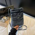 Blue denim crossbody phone bag with washed texture and metal button pocket - Retro Blue