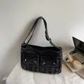 Minimalist black denim tote bag with functional pockets and adjustable silver buckles - Black