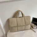 Chic beige quilted puffer tote bag with square texture and durable zipper closure - Off White