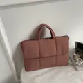Quilted padded laptop bag in rose pink featuring a thick cushioned design and handles - Dusty Pink