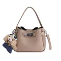 Beige bucket bag in litchi grain leather with teddy bear charm and silver clasp - Khaki With Pendant
