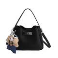 Black pebbled leather bucket bag with silver twist lock and cute plush puppy charm - Black With Pendant
