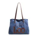 Blue denim tote bag with brown leather straps and artistic LOO lettering for daily use - Tan Denim Style