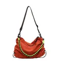 Fashionable orange shoulder tote bag with decorative black and green woven ropes and strap - Orange