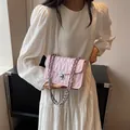 Pale pink quilted crossbody chain bag with elegant silver metallic twist lock closure - Pink
