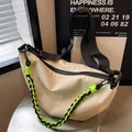 Off-white nylon crescent crossbody bag with distinctive neon green braided rope detail - Off-white