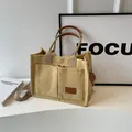 Borsa tote in tela giallo chiaro con tasche frontali e tracolla regolabile rimovibile - Cachi