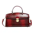 Rote Handtasche mit Schlangenmuster, goldenem Drehverschluss und Schultergurt - Rot