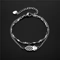 Bracelet double rang en acier inoxydable avec pendentif ananas ajouré et chaîne réglable - Style Perles de Riz