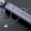 Collana a due strati in acciaio al titanio argento con ciondolo a cuore LOVE - Ciondolo Tondo LOVE (SC3 Perline)