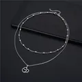 Double-layered stainless steel heart necklace with polished beads and cutout pendant - Double Heart Pendant (SC9 Beaded)