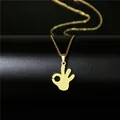 Macro shot of 18K gold plated OK gesture pendant on minimalist O-link chain necklace - OK Gesture Style (89)