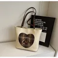 Beige tote bag with brown heart pattern and cartoon dachshund embroidery detail - Without Pendant / Off White