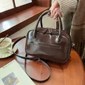 Retro dark brown glossy leather tote bag with shoulder strap and dual zipper design - Coffee