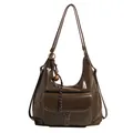 Dark brown retro hobo bag in glossy leather with white stitching and belt buckle detail - Green