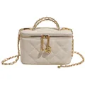 Elegant cream quilted vanity bag with golden chain and camellia zipper detail - White