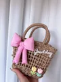 Handwoven basket bag with pink bow, tulip charms and Goodday embroidery for beach vacation - Khaki with Pink Bow