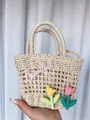 Floral woven straw handbag with pink 'Beautiful' embroidery and tulip accents - White