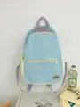 Sac à dos en nylon patchwork bleu clair et beige avec bretelles violettes et broderie - Bleu Fermeture Éclair Horizontale