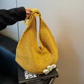 Large yellow crochet shoulder bag with white flower charm for summer beach vacation - Orange