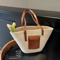 Chic cream cotton rope woven tote bag with brown leather handles and front pocket detail - Beige