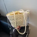 Stro geweven handtas in crèmewit met kanten strik en trekkoord voor de zomer - Off-white Stijl 1
