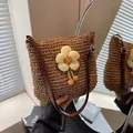 Dark brown straw shoulder bag with decorative yellow flower and adjustable strap - Sunflower Decor Khaki