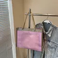 Purple transparent PVC tote bag with gold braided rope handles for beach vacations - Pink