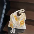 Cream crochet tote bag with colorful floral embroidery and hollow knit design - Off White