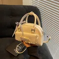 Creamy white bowling bag with lace bow detail and blue checkered ribbon handle - Yellow