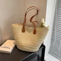 Borsa tote intrecciata beige con manici in pelle marrone per vacanze al mare e relax - Bianco Sporco