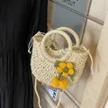 Detail of woven straw bag with yellow flower charm and drawstring liner for summer - Beige Yellow Flower