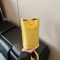 Mini yellow crossbody phone bag featuring a premium lychee pattern leather finish - Without Charm Style / Yellow