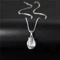 Pendentif gant de boxe rétro en acier inoxydable argenté pour style fitness masculin - Style Gant de Boxe Argenté