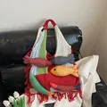 Bohemian knit tote bag with colorful fish patterns and red tassels in a casual style - Red