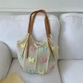 Beige hollow-out woven tote bag with 3D colorful butterflies and brown leather handles - White