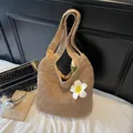 Large straw hobo shoulder bag in natural camel color featuring white plumeria accents - With Flower / Khaki